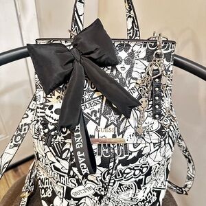 Rare discounted GUESS Varsity Pop Graffiti Backpack